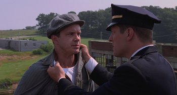 Movie still from “The Shawshank Redemption” (1994), directed by Frank Darabont – Close Up shot, Over the shoulder angle