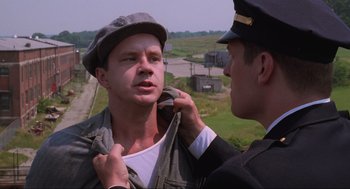 Movie still from “The Shawshank Redemption” (1994), directed by Frank Darabont – Close Up shot, Over the shoulder angle