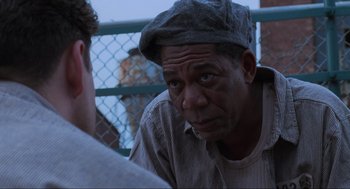 Movie still from “The Shawshank Redemption” (1994), directed by Frank Darabont – Close Up shot, Over the shoulder angle