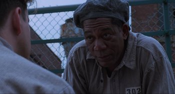 Movie still from “The Shawshank Redemption” (1994), directed by Frank Darabont – Close Up shot, Over the shoulder angle