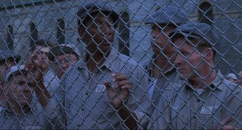 Movie still from “The Shawshank Redemption” (1994), directed by Frank Darabont – Medium shot, High angle