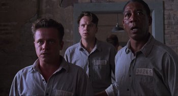 Movie still from “The Shawshank Redemption” (1994), directed by Frank Darabont – Medium shot, Low angle
