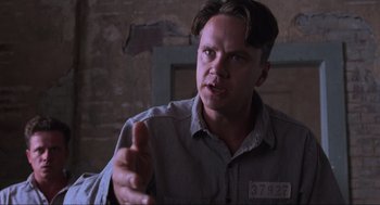 Movie still from “The Shawshank Redemption” (1994), directed by Frank Darabont – Close Up shot, Over the shoulder angle