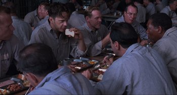 Movie still from “The Shawshank Redemption” (1994), directed by Frank Darabont – Medium shot, Over the shoulder angle