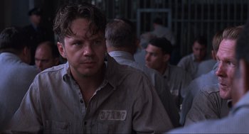 Movie still from “The Shawshank Redemption” (1994), directed by Frank Darabont – Close Up shot, Over the shoulder angle