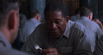 Movie still from “The Shawshank Redemption” (1994), directed by Frank Darabont – Close Up shot, Over the shoulder angle