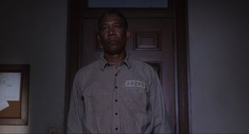 Movie still from “The Shawshank Redemption” (1994), directed by Frank Darabont – Medium shot, Low angle