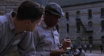 Movie still from “The Shawshank Redemption” (1994), directed by Frank Darabont – Medium shot, Over the shoulder angle