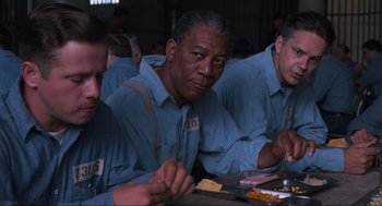 Movie still from “The Shawshank Redemption” (1994), directed by Frank Darabont – Medium shot, Over the shoulder angle