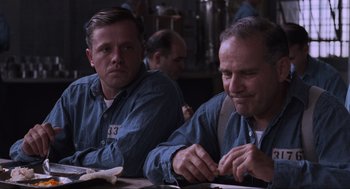 Movie still from “The Shawshank Redemption” (1994), directed by Frank Darabont – Medium shot, Over the shoulder angle