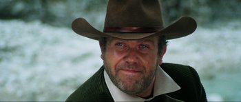 Movie still from “The Specialists” (1969), directed by Sergio Corbucci – A person wearing a cowboy hat; Close Up shot, Low angle