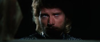 Movie still from “The Specialists” (1969), directed by Sergio Corbucci – A person with long hair; Close Up shot, Low angle