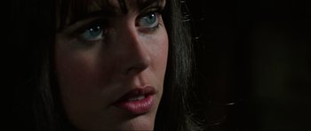 Movie still from “The Specialists” (1969), directed by Sergio Corbucci – A woman's face with blue eyes; Close Up shot, Over the shoulder angle