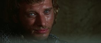 Movie still from “The Specialists” (1969), directed by Sergio Corbucci – A man's face with water on his face; Close Up shot, Over the shoulder angle