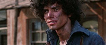 Movie still from “The Specialists” (1969), directed by Sergio Corbucci – A person wearing a jacket; Close Up shot, Low angle