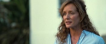 Movie still from “The Starling” (2021), directed by Theodore Melfi – A person with long curly hair; Close Up shot, Over the shoulder angle