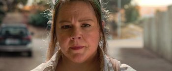 Movie still from “The Starling” (2021), directed by Theodore Melfi – A person wearing a head scarf; Close Up shot, Low angle