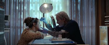 Movie still from “The Starling” (2021), directed by Theodore Melfi – An older man and a younger woman getting their nails done; Close Up shot, Over the shoulder angle