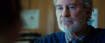 Movie still from “The Starling” (2021), directed by Theodore Melfi – An older man with a beard and a blue shirt; Close Up shot, Over the shoulder angle