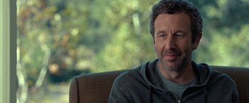 Movie still from “The Starling” (2021), directed by Theodore Melfi – A person sitting in a chair; Close Up shot, Over the shoulder angle