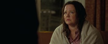 Movie still from “The Starling” (2021), directed by Theodore Melfi – A woman sitting in front of a window with a blanket draped over her; Close Up shot, Over the shoulder angle