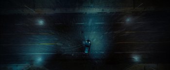 Movie still from “The Starling” (2021), directed by Theodore Melfi – A car driving down a street at night time; Extreme Wide shot, Overhead angle