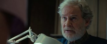 Movie still from “The Starling” (2021), directed by Theodore Melfi – An older man with white hair and a white beard; Close Up shot, Low angle