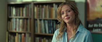 Movie still from “The Starling” (2021), directed by Theodore Melfi – A person in a room with a book shelf in the background; Close Up shot, Over the shoulder angle