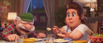 Movie still from “The Super Mario Bros. Movie” (2023), directed by Aaron Horvath – Two people sitting at a table eating spaghetti; Close Up shot, Over the shoulder angle
