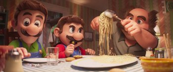 Movie still from “The Super Mario Bros. Movie” (2023), directed by Aaron Horvath – A man is eating pasta with a mustache while mario is sitting at the table; Medium shot, Over the shoulder angle