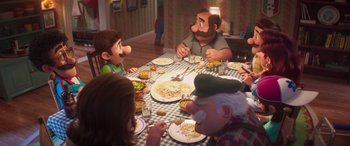 Movie still from “The Super Mario Bros. Movie” (2023), directed by Aaron Horvath – A group of people sitting at a table eating pasta; Medium shot, High angle