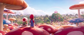 Movie still from “The Super Mario Bros. Movie” (2023), directed by Aaron Horvath – A video game scene with a giant mushroom; Extreme Wide shot, High angle