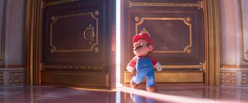 Movie still from “The Super Mario Bros. Movie” (2023), directed by Aaron Horvath – A toy mario standing in front of a door; Medium shot, Over the shoulder angle