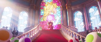 Movie still from “The Super Mario Bros. Movie” (2023), directed by Aaron Horvath – A stained - glass window in the middle of a staircase; Extreme Wide shot, Low angle