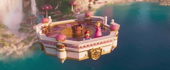 Movie still from “The Super Mario Bros. Movie” (2023), directed by Aaron Horvath – A toy castle with a princess on top of it; Extreme Wide shot, High angle