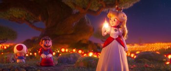 Movie still from “The Super Mario Bros. Movie” (2023), directed by Aaron Horvath – A little girl dressed as a princess holding a light; Wide shot, Over the shoulder angle