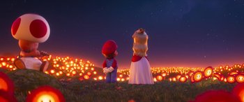 Movie still from “The Super Mario Bros. Movie” (2023), directed by Aaron Horvath – A couple of people standing next to each other on top of a grass field; Extreme Wide shot, Over the shoulder angle