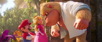 Movie still from “The Super Mario Bros. Movie” (2023), directed by Aaron Horvath – A woman in a pink dress and a man in a white shirt; Medium shot, Over the shoulder angle