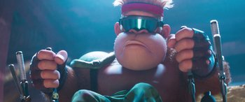 Movie still from “The Super Mario Bros. Movie” (2023), directed by Aaron Horvath – A cartoon character's face with goggles on; Close Up shot, Low angle
