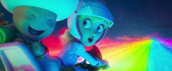 Movie still from “The Super Mario Bros. Movie” (2023), directed by Aaron Horvath – A person wearing a helmet and riding on a motorcycle; Medium shot, Low angle