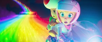 Movie still from “The Super Mario Bros. Movie” (2023), directed by Aaron Horvath – A group of cartoon characters in a colorful light show; Close Up shot, Low angle