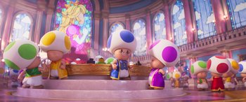 Movie still from “The Super Mario Bros. Movie” (2023), directed by Aaron Horvath – A couple of cartoon characters sitting next to each other; Medium shot, Over the shoulder angle