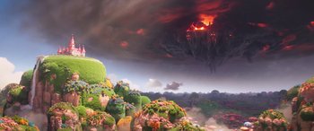 Movie still from “The Super Mario Bros. Movie” (2023), directed by Aaron Horvath – An image of an animated scene with a volcano in the background; Extreme Wide shot, High angle