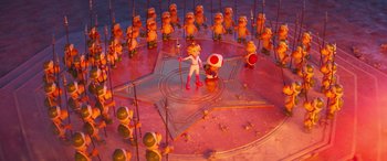 Movie still from “The Super Mario Bros. Movie” (2023), directed by Aaron Horvath – A group of yellow rubber duckies in a pink room; Wide shot, High angle