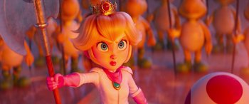 Movie still from “The Super Mario Bros. Movie” (2023), directed by Aaron Horvath – A doll with a crown on it's head; Close Up shot, Over the shoulder angle