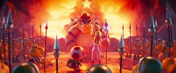 Movie still from “The Super Mario Bros. Movie” (2023), directed by Aaron Horvath – A video game scene with a woman and a giant bowser; Wide shot, Over the shoulder angle