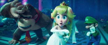 Movie still from “The Super Mario Bros. Movie” (2023), directed by Aaron Horvath – A princess peach figurine in a scene from a video game; Close Up shot, Over the shoulder angle
