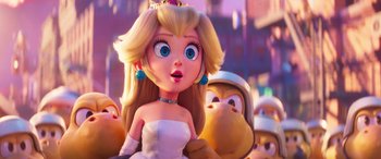 Movie still from “The Super Mario Bros. Movie” (2023), directed by Aaron Horvath – A woman in a white dress is standing in front of a group of people; Close Up shot, Over the shoulder angle