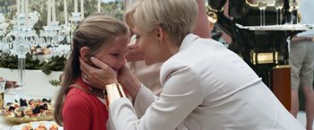 Movie still from “Elysium” (2013), directed by Neill Blomkamp – An older woman and a young girl touching each other's face; Close Up shot, Over the shoulder angle