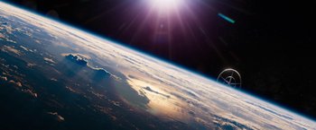 Movie still from “Elysium” (2013), directed by Neill Blomkamp – A view of the earth taken from a space station; Extreme Wide shot, Overhead angle